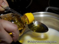 Mix milk, oil and salt in cooking pot