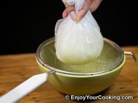 Pull edges of cheesecloth together